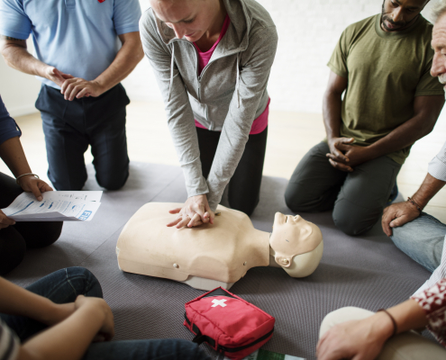 Group of diverse people in cpr training class